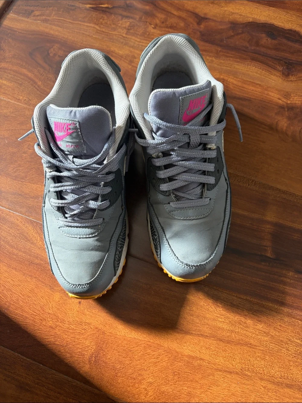 Nike Gray Sneakers with Pink Logo and Yellow Outsole